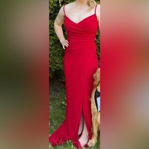 Red prom dress. Diamond shape open back with slit down the leg